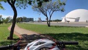 bicycle mobility in brasilia featured image showing a grass field behind a helmet