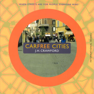 book cover to carfree cities showing a street with a orange circle around it