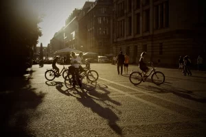 exploring velotopian-urban imaginaries - cyclists standing on a road