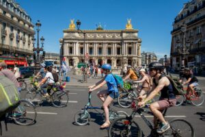 Cyclists on a street in paris as part of La Convergence - a social movement
